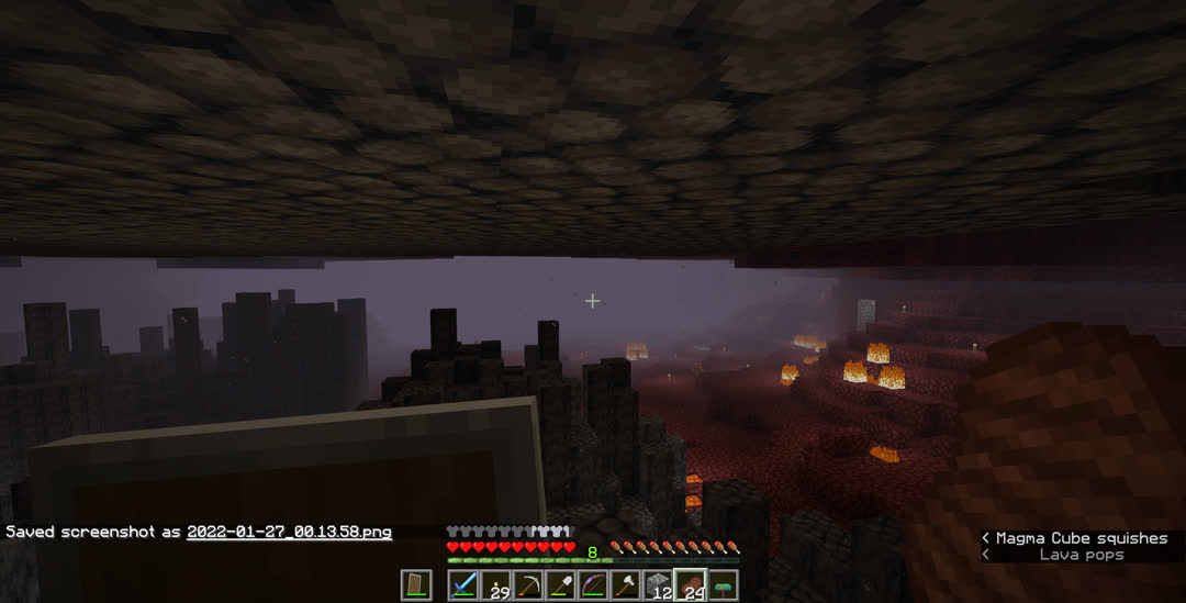 Overlooking basalt pillers which give way to the more open nether wastes.