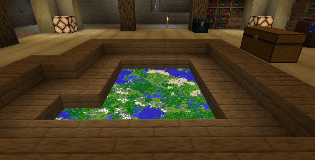 In the center of the room’s floor is a map of the known world framed by spruce steps. From this angle it’s clear the room is unfinished and there is an empty underground space behind the bookshelf walls.