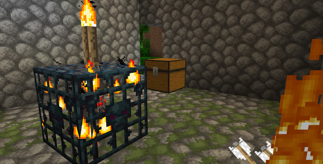 Interior of the dungeon. A torch is atop the spider spawner and there is a single chest next to the opening from the jungle.