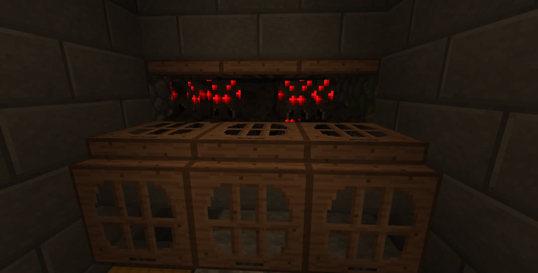 Numerous spiders as seen from the killing area, blocked from the player by trapdoors.