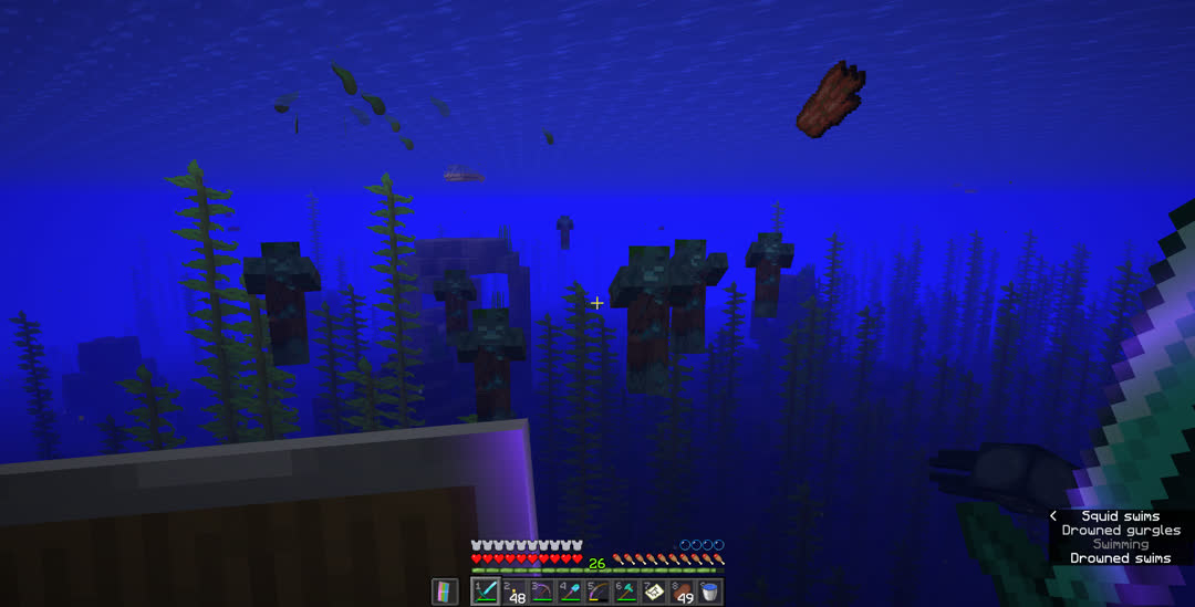 At least seven drowned coming at me near some ocean ruins with rotten flesh and kelp floating in the water.