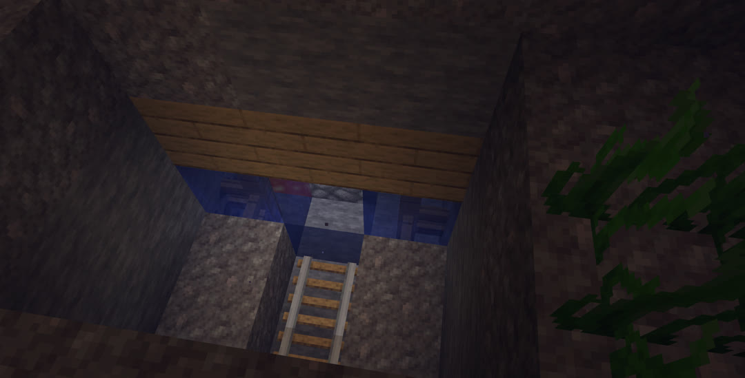 Gravel above an abandoned mineshaft has fallen in and exposed it.