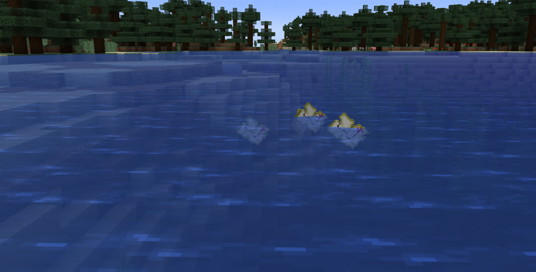 Four treasure maps floating in the ocean near shore.