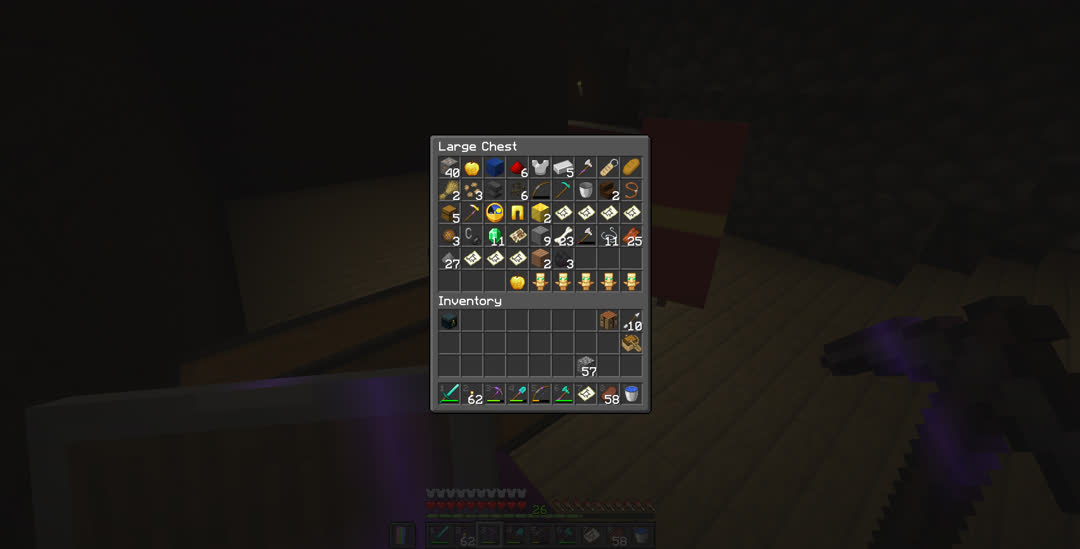 A large chest containing various items including loot from the mansion.