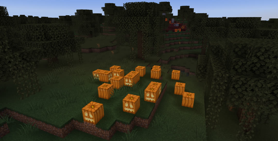 A patch of jack‐o’‐lanterns in the swamp with a ruined nether portal in the background.