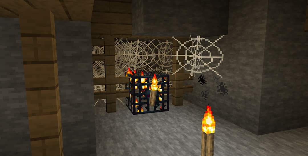 Abandoned mineshaft with a cave spider spawner; behind it are thick cobwebs.