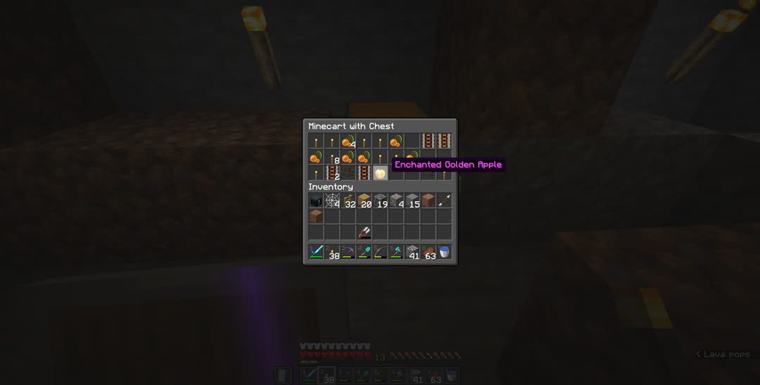 Inventory of a chest minecart containing 16 torches, nine glow berries, four activator rails, one powered rail, two melon seeds, and an enchanted golden apple.