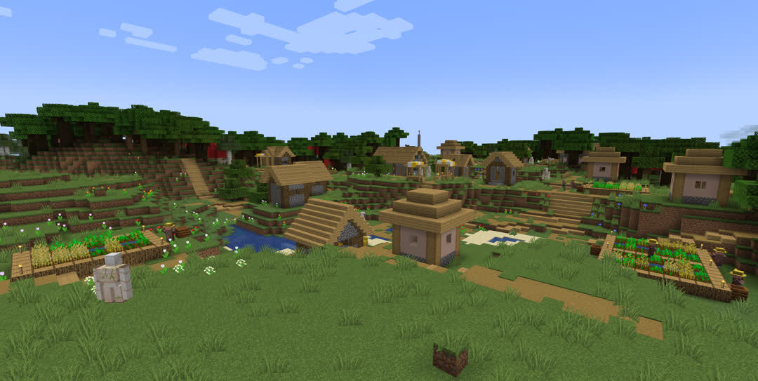 Overview of the hilly village. About a dozen buildings are visible along with several farms, mostly closer to the camera. Dark oak forest nearly wraps around the far side of the village, though there is a gap in the center.