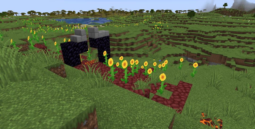 A ruined nether portal in a sunflower plains. Some grass and plenty of sunflowers are growing illegally on the netherrack.