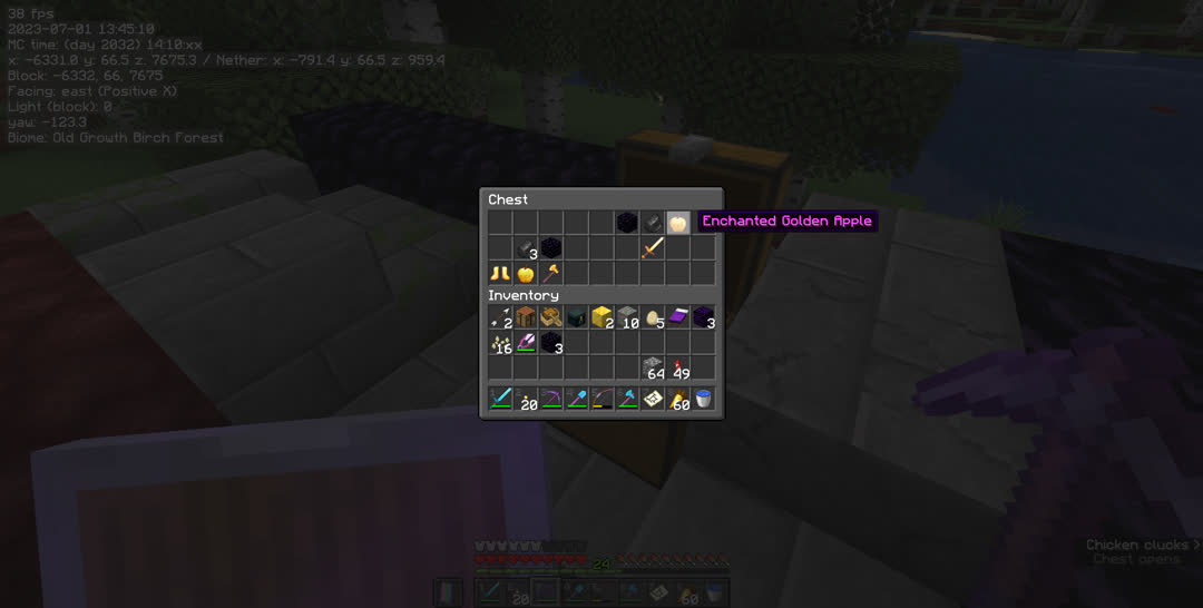 Loot chest at the ruined nether portal. Besides the enchanted golden apple, there’s a regular golden apple, two obsidian, and four flint, plus a gold axe, sword, and pair of boots.